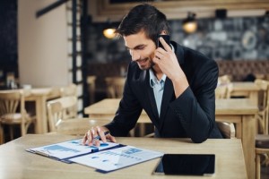 man_talking_to_a_customer-300x200