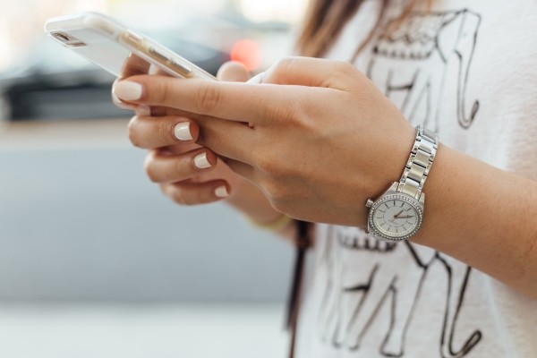 Woman Using her iPhone