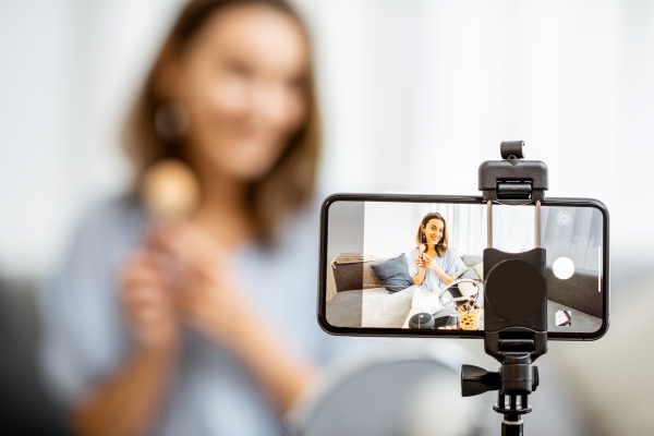 Woman Filming Digital Video Campaign
